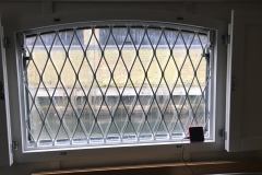 Curved-removable-mesh-on-canal-boat